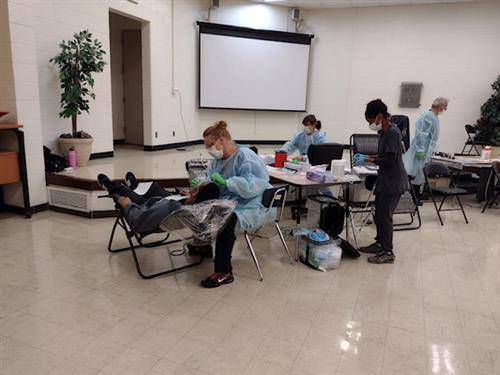 student getting teeth cleaned